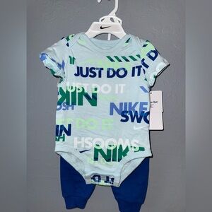 Nike Light Blue Baby Onesie & Navy Pants with Green Accent Logos